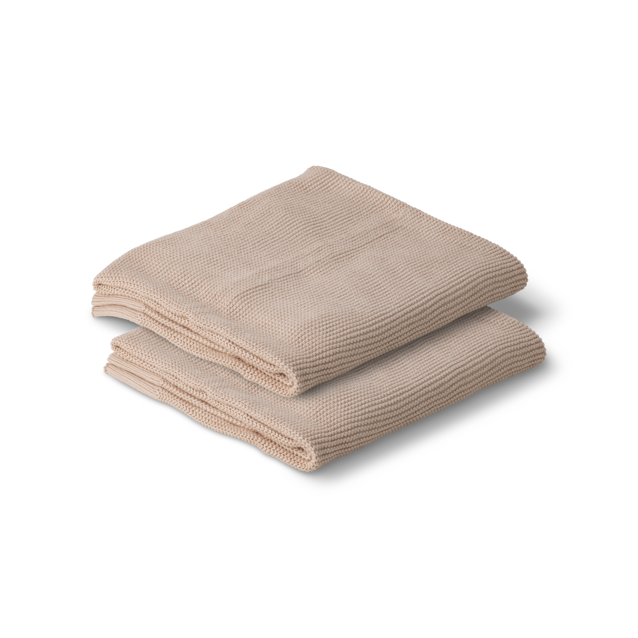 Folded beige cotton knitted baby blanket on a white background