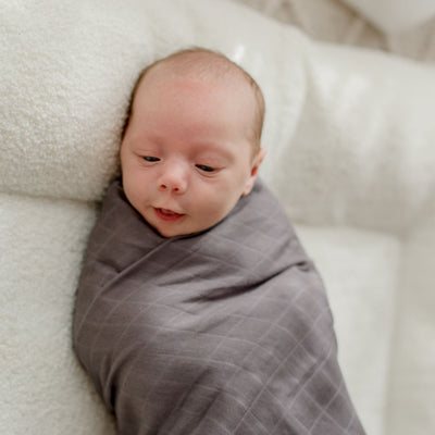 Storm grey organic cotton muslin swaddle wrap by Zoe Sage