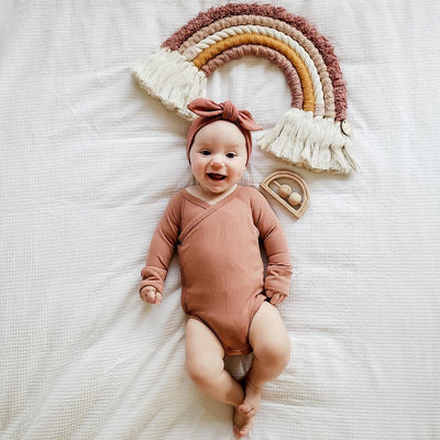 Rust coloured baby top knot headband by Zoe Sage