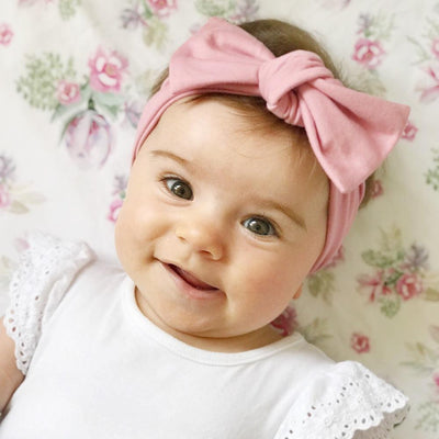 Rose baby bow knot headband displayed on white background by Zoe Sage