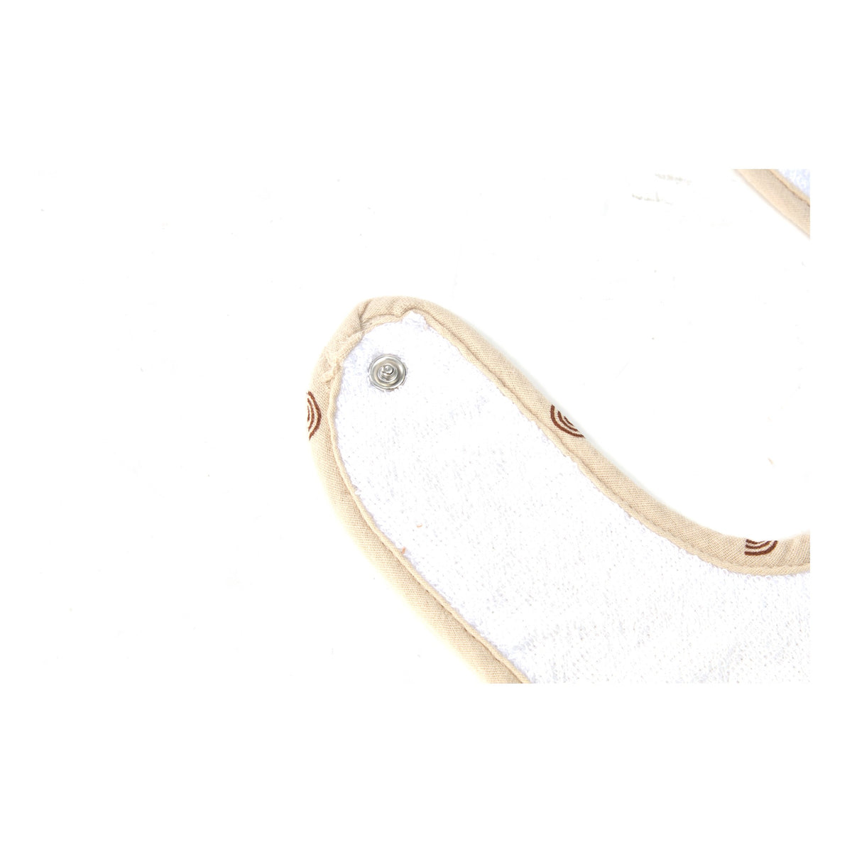 Close up of the press stud fastening on a Zoe Sage muslin baby bib
