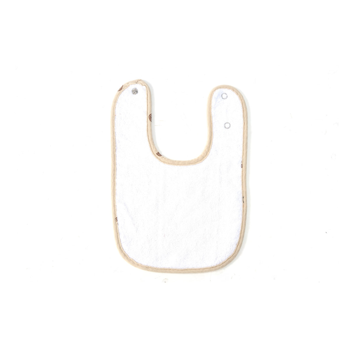 Back of a muslin baby bib showing the soft white terry towelling and adjustable snaps