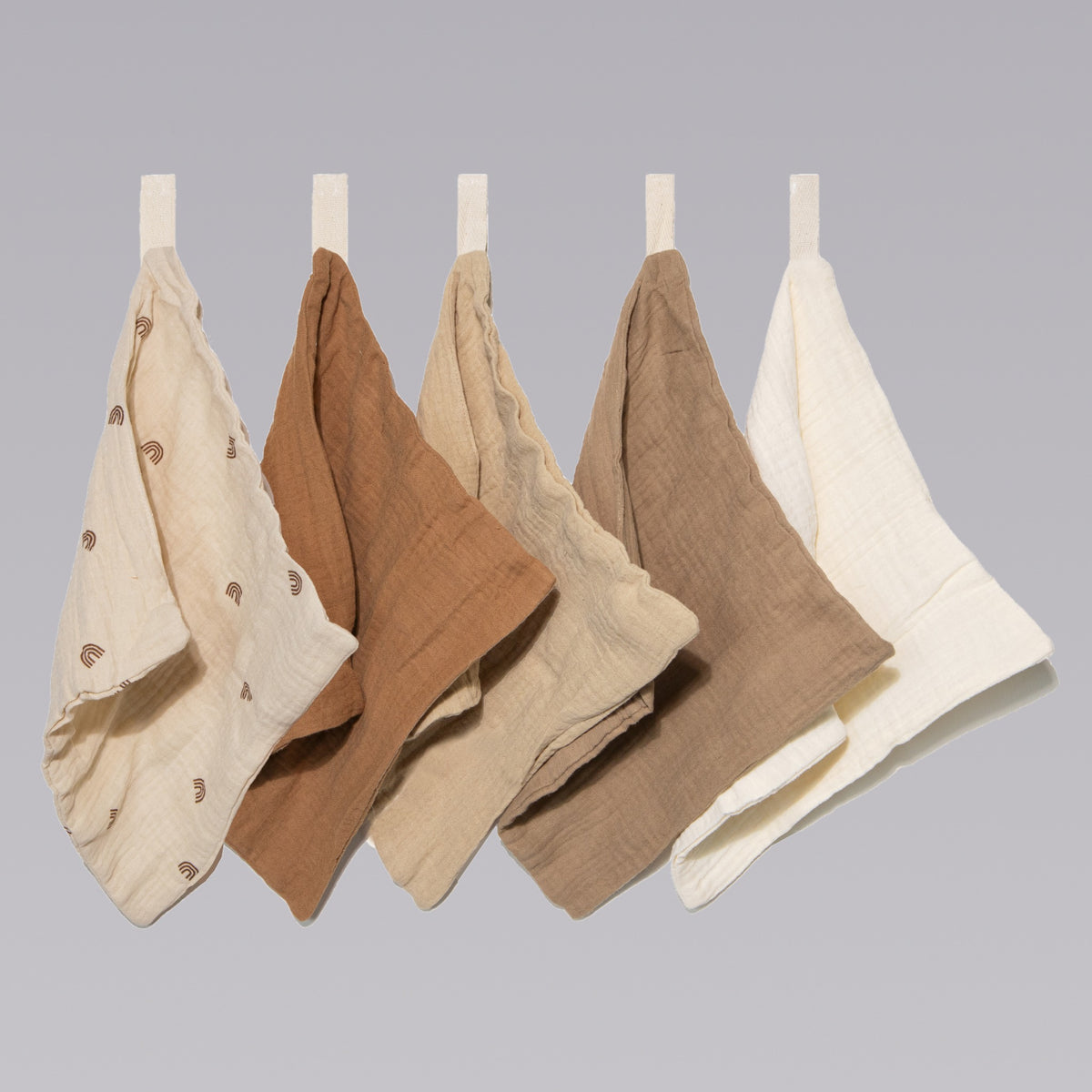 Five organic muslin wash cloths in dusty dunes color by Zoe Sage