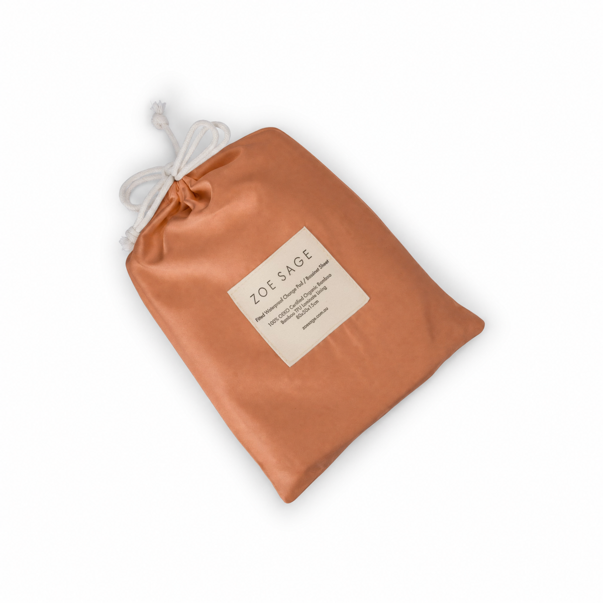 Savannah Rust waterproof bassinet sheet and change pad cover drawstring bag laid flat, label detail