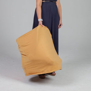 Women carrying a baby carrier in dull peach color